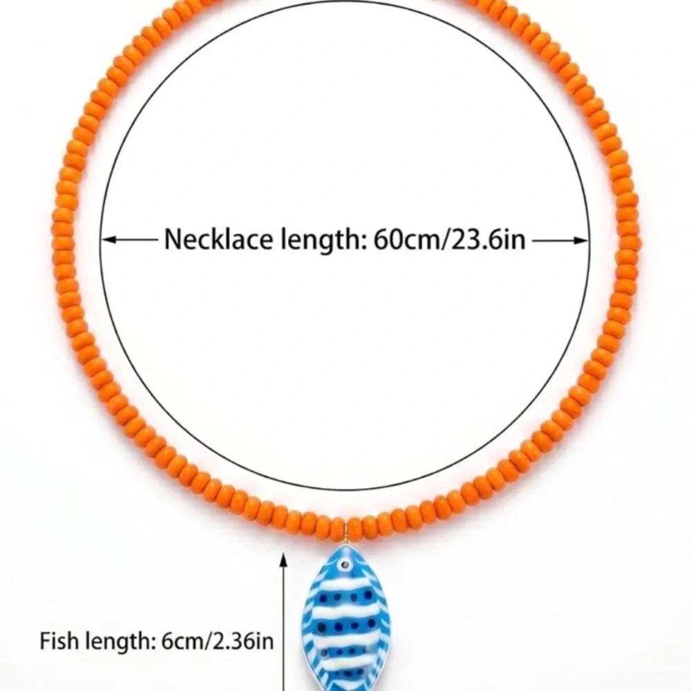 Orange Beaded Necklace with Blue Fish Charm